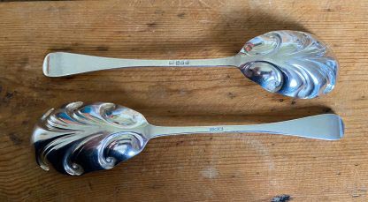 pair of silver berry spoons